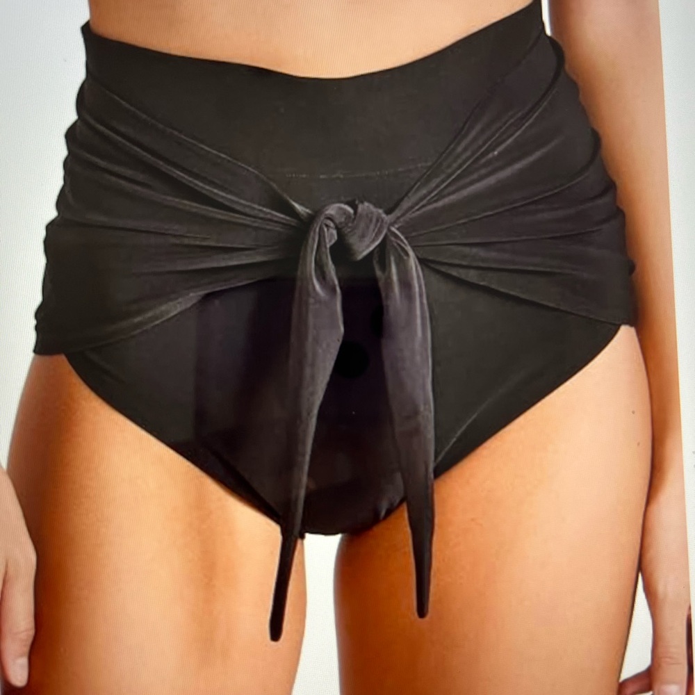 NWT. So versatile to wear I bought 2 but only need one.